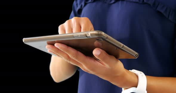 Businesswoman using a digital tablet