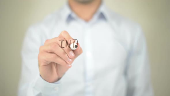 Integrated Marketing, Businessman Writing on Transparent Screen