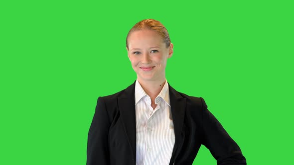 Beautiful Young Woman in Formal Outfit Smiling To Camera on a Green Screen Chroma Key