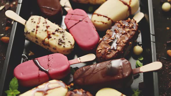 Ice Cream on Stick Coated with Various Chocolate Glazes and Toppings