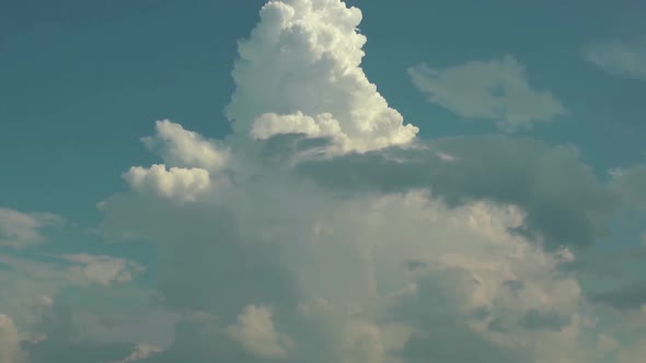 Slowly White Clouds Spreading On The Blue Sky