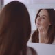 Woman Looking at Mirror at Home - VideoHive Item for Sale