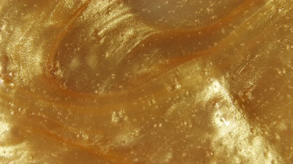 Liquid Metallic Gold Background Texture