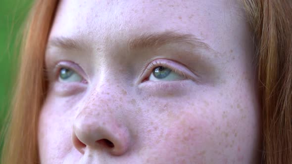 Beautiful Eyes of a Redhead Girl Close Up