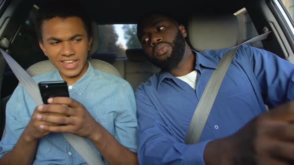 Teenager Hiding Phone From Caring Dad Trying to Read Messages, Parent Control