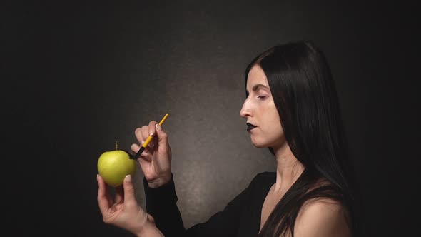 Girl Dyes an Apple