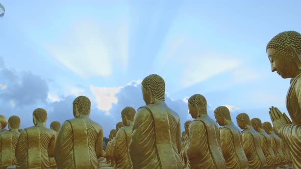 Light Through The Sky Over Buddha Statues