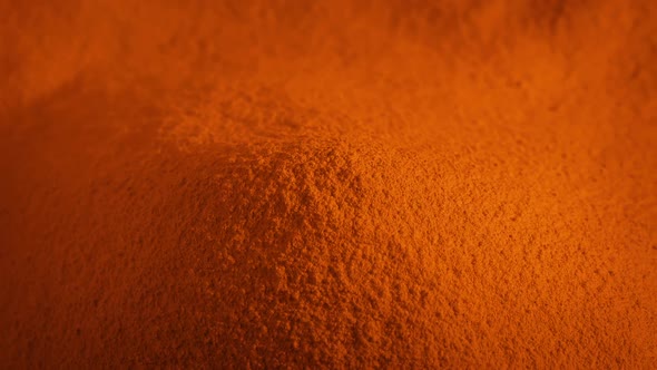 Orange Powder Pile Rotating Closeup