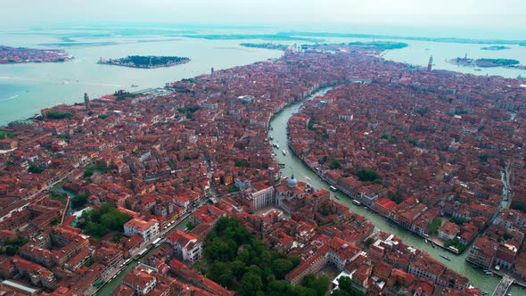 Venice Italy, Europe travel destination, aerial view of rooftops and channel.