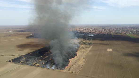 Burning Grass Field From Above