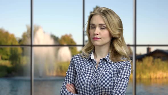 Portrait of Young Woman with Proud and Arrogant Expression.