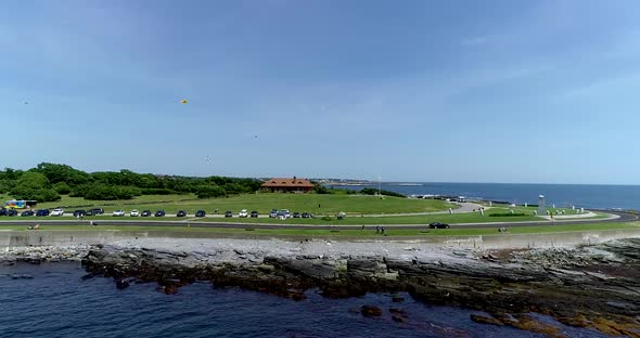 Brenton Point in Newport Rhode Island.  Features drone shot of shoreline with cars and kites.