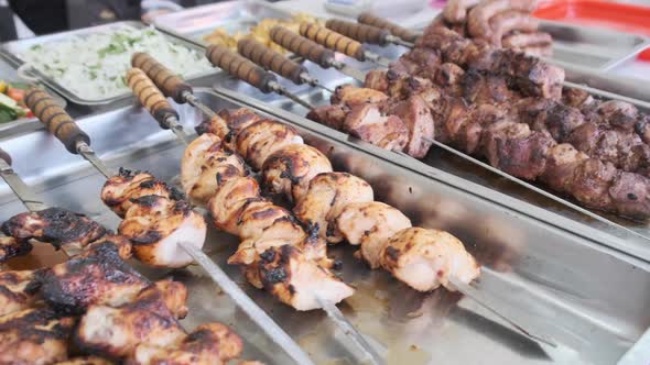 Grilled Vegetables and Meat in Street Shop Window. Food Court with Grilled Meals