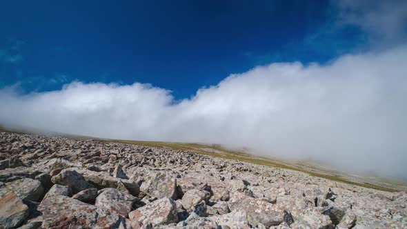 Time-lapse shot of moving white clouds at Abuli Mountain. Georgia