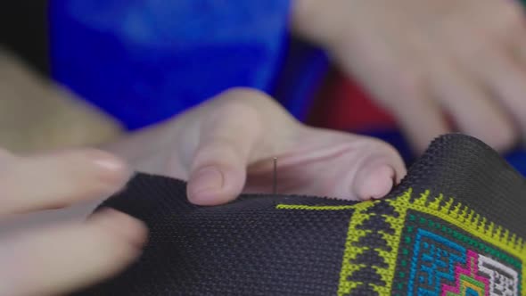 Hands Sewing Hmong Traditional Costume