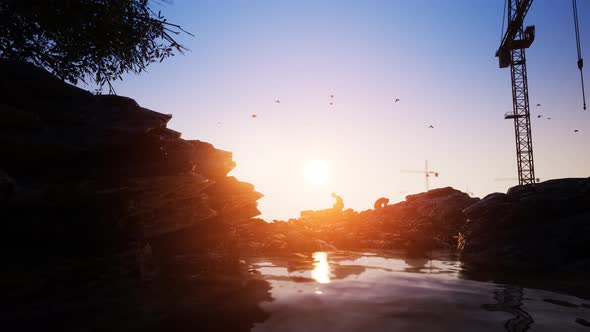 Construction Workers Break The Stones On The Beach 4K alt