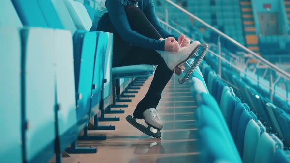 Skate is Getting Laced Up By a Young Girl