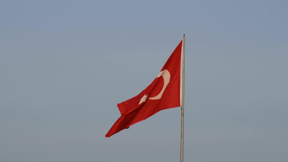 republic of turkey flag and blue sky with wind rippling,