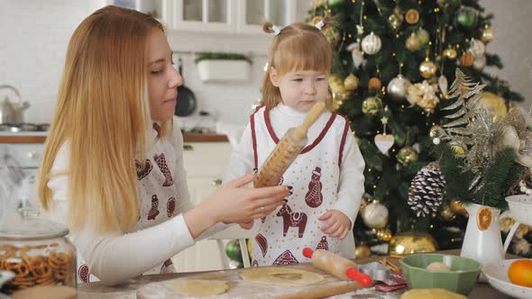 Mom and Daughter are Going to Make Christmas Cookies