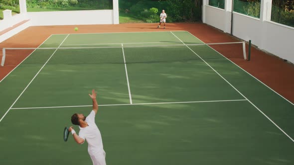 Tennis players playing a point