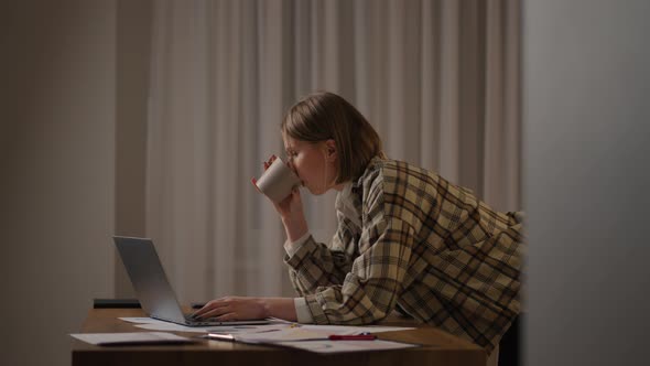 A Girl Works From Home or a Student is Studying From Home or a Freelancer