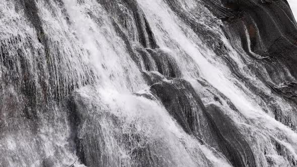 Close view of water cascading down at Gibbon Falls in Yellowstone
