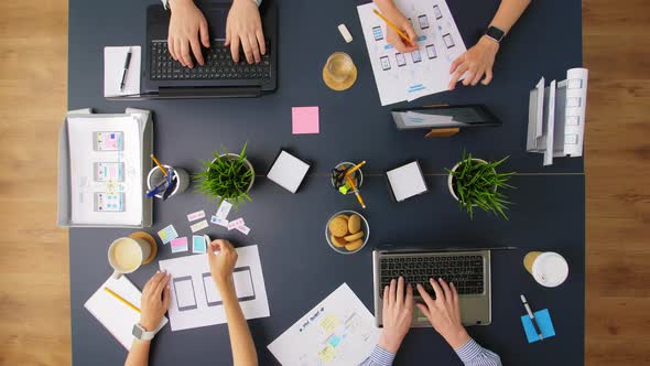 Business Team with Gadgets Working at Office Table