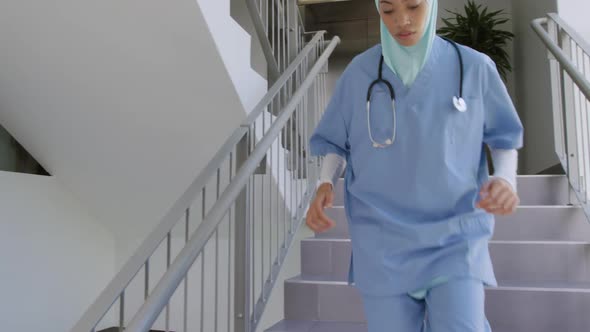 Medical professional working at a hospital alt