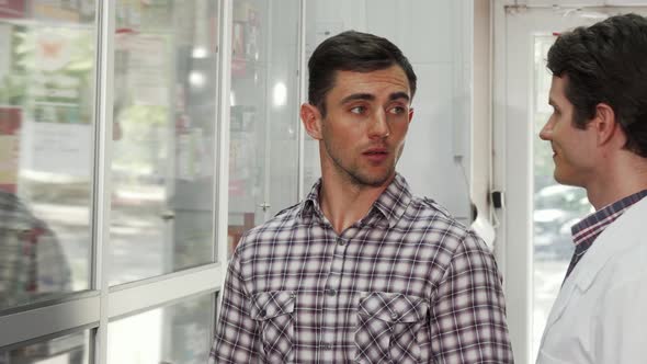 Young Handsome Man Shopping at the Drugstore