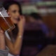 Girl drinking a beer with friends at a bar in Patagonia Argentina - VideoHive Item for Sale