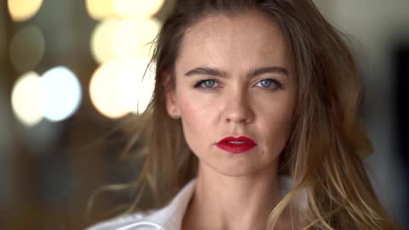 Closeup Portrait of Sexy and Beautiful Woman, She Is Looking at Camera