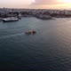 Drone View of a Lone Boat Sailing Out of the Port of Athens - VideoHive Item for Sale