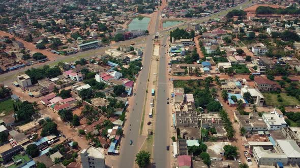 Cinematic Aerial View of African City road traffic, Lomé, West Africa