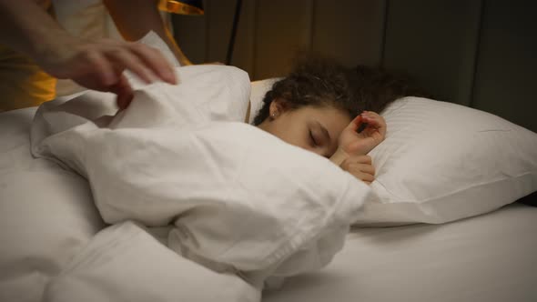 Child Little Baby Daughter Sleeps Sweetly in His Crib and Smiles in His Sleep