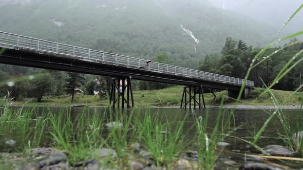 Man diving off of bridge into river (Slow Motion!)