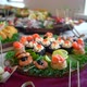 A set of seafood rolls with fish, caviar, shrimps and cream cheese on a buffet table - VideoHive Item for Sale
