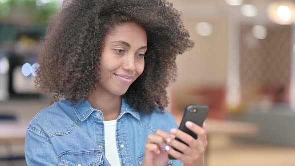 Close Up of Serious Young Woman Looking at Camera