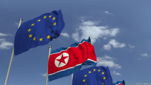 Waving Flags of North Korea and the EU