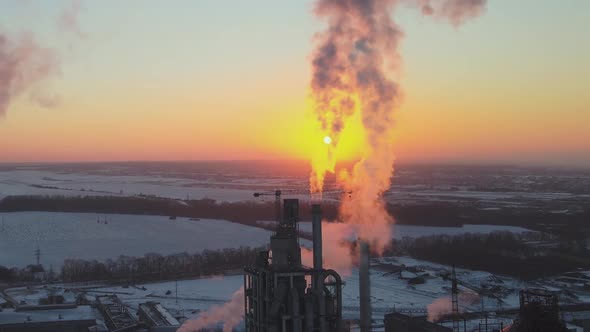 Aerial View of Cement Factory Tower with High Concrete Plant Structure at Industrial Production Area