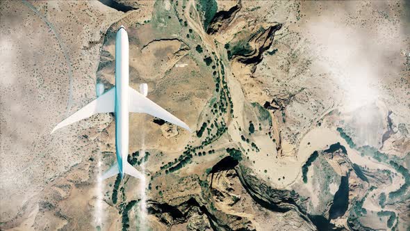 Airplane Flying Above Grand Canyon