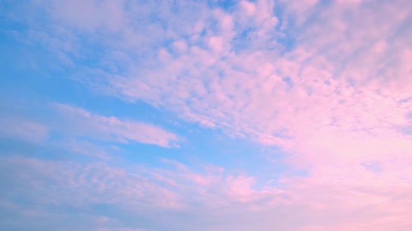 4K UHD : Time lapse of colorful sky during beautiful sunset. Romantic clouds. Summer sky