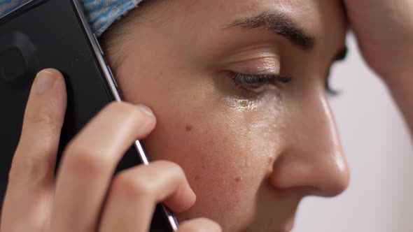 Crying Doctor or Nurse Calling on Smartphone