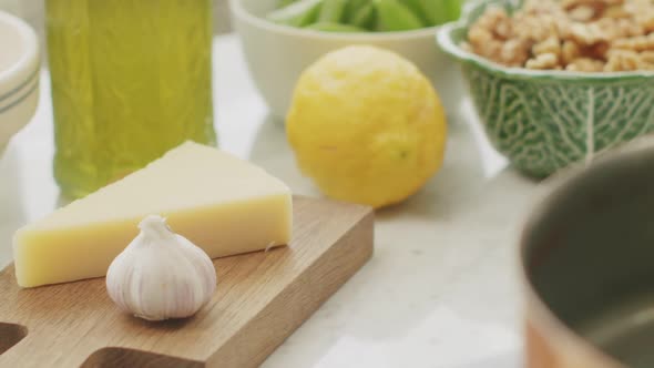 Fresh raw ingredients for pasta preparation arranged on table