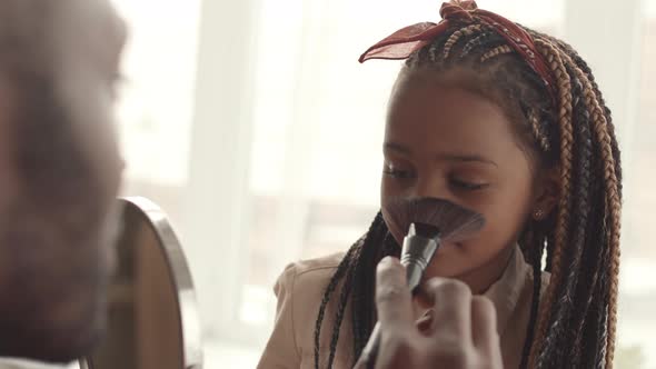 Little African Girl Getting Makeup