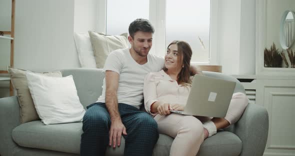 Pajamas Morning for a Couple in Living Room