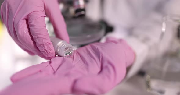 Scientist Pours Mercury or Liquid Metal From Bottle