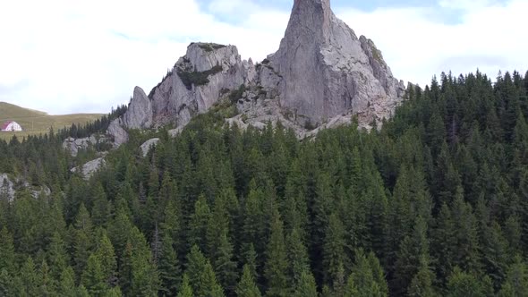 Aerial Reveal Of Lady's Stones Mountain Peaks In Romania