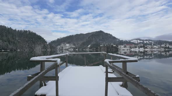 Wooden pier with railing