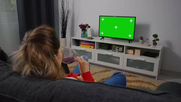 Woman Watching TV Green Screen and Chroma Key.