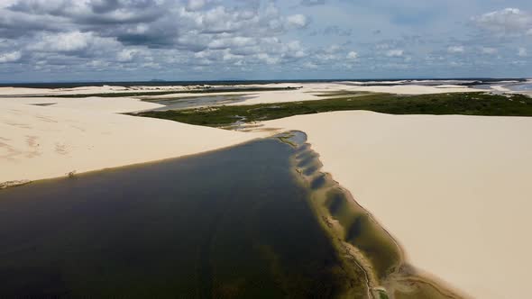 Brazilian landmark rainwater lakes and sand dunes. Jericoacoara Ceara.